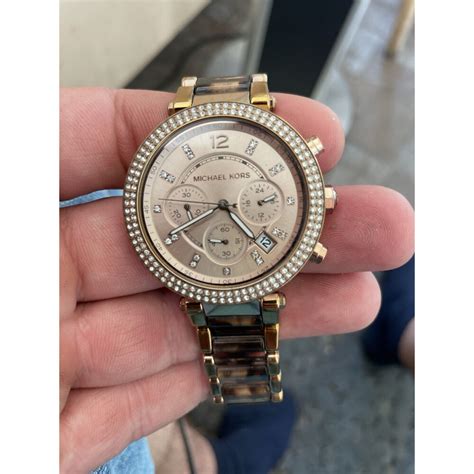 jak wlaczyc krokomierz w michael kors|Video Instrukcja Chronografu w damskim zegarku Michael Kors.